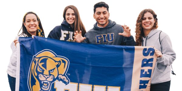 image of FIU students holding an FIU banner