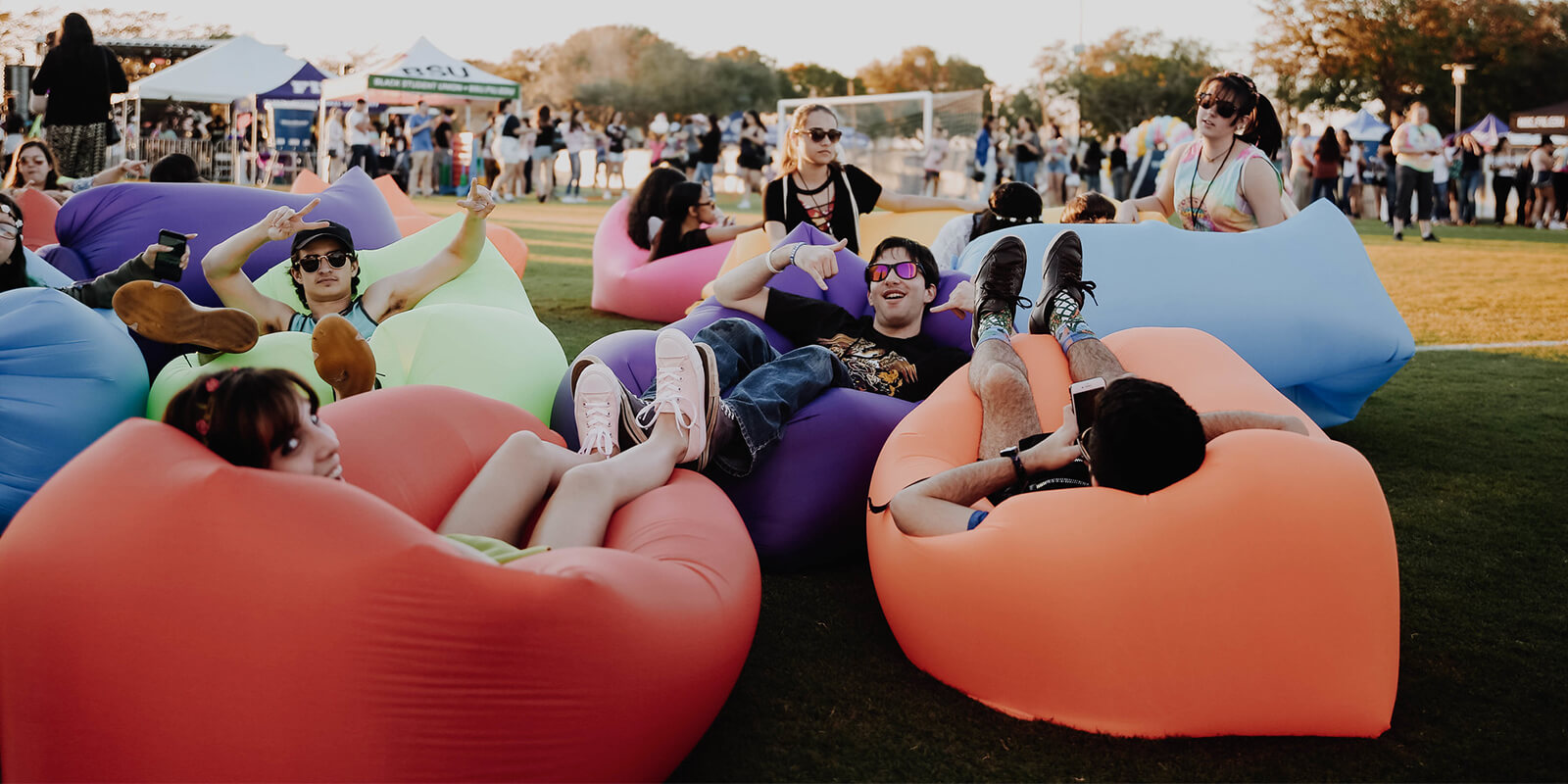 A group of FIU students lounging about in beanbag chairs. 