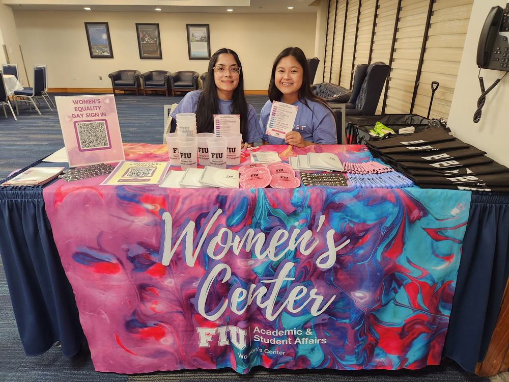 FIU students tabling for the Womens Center