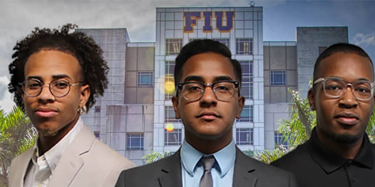 Three male students standing in front of FIU's Green Library.